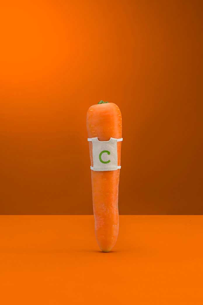 Carrot wearing a netball bib