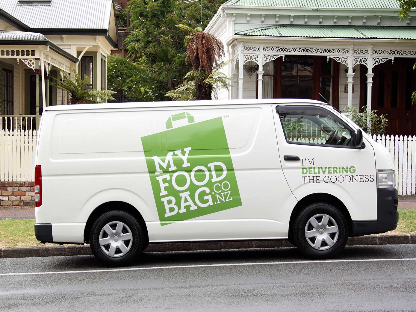 My Food Bag van stopped in front of some houses